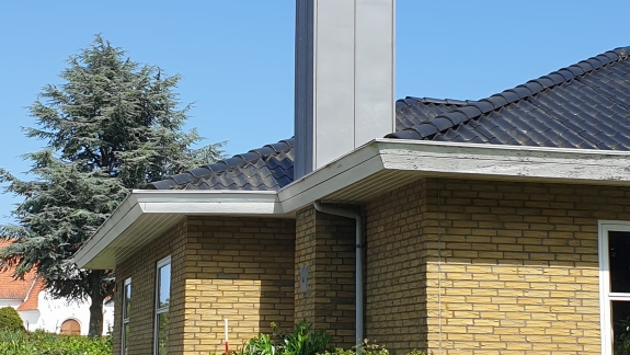 Facade på skorsten beklædt med zink